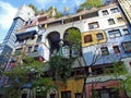 Hundertwasser House, Wien Artist`s creation of brightly painted, natural apartment block with a forested roof & balconies