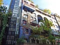 Hundertwasser House, Wien Artist`s creation of brightly painted, natural apartment block with a forested roof & balconies