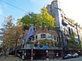 Hundertwasser House, Wien Artist`s creation of brightly painted, natural apartment block with a forested roof & balconies