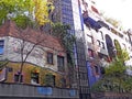 Hundertwasser House, Wien Artist`s creation of brightly painted, natural apartment block with a forested roof & balconies