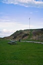 Hundested, Denmark picnic place in front of the cliffs. Flagpole with the Danish flag