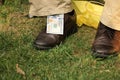 Hundred dollar bill hangs out of guys pants