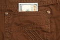Hundred dollar bill inside back pocket jeans