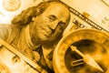 Hundred dollar bills and a blurry old dusty compass.  Close-u Royalty Free Stock Photo