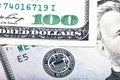 Hundred dollar near seal of Federal Reserve System. Stacked macr Royalty Free Stock Photo
