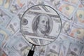 us dollar bill through magnifying lens checking banknotes Royalty Free Stock Photo