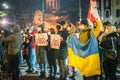 Hundred years anniversary event on Tbilisi. Young caucasian people stands with anti-russian