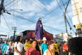 Hundreds of Catholic faithful carry the statue of Mary during the procession of the Passion of Christ