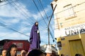 Hundreds of Catholic faithful carry the statue of Mary during the procession of the Passion of Christ