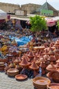 Hundreds of colorful tajine cooking pots stacked on market in soukh of Meknes, Morocco, North Africa Royalty Free Stock Photo