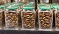 Hundreds of crickets in glass containers. Insect farming. Edible insects. AI Generated Image