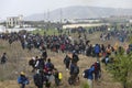 Hundreds of migrants and refugees gathered outside of a refugee camp in Diavata Royalty Free Stock Photo