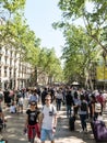 Hundreds of people promenading in the busiest street of Barcelona, the Ramblas. Royalty Free Stock Photo