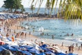 Hundreds of people are seen on Porto da Barra beach bathing in the sun and sea in the city of Salvador, Bahia