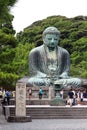 Hundreds of pilgrims, tourists and local people visit everyday the Daibutsu, the famous great bronze buddha statue in kamakura.