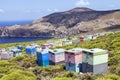 Hundreds of rustic hilltop wooden honey beehives overlooking the Mediterranean sea Royalty Free Stock Photo