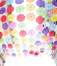 Hundreds of Umbrellas Float Above The Streets