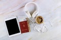 The Hungarian citizenship passports, overhead cup of black espresso coffee, tablet and headphone in marble background Royalty Free Stock Photo