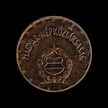 Hungarian coin over a black background