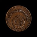 Hungarian coin over a black background