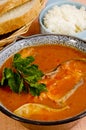 Hungarian fish soup with bread and rice