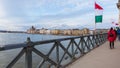 The Hungarian flag over river Danube on the Chain Bridge with a view to Parliament building in Budapest.