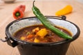 Hungarian Goulash or Gulyas Served in a Small Cauldron Royalty Free Stock Photo