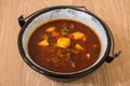 Hungarian Goulash or Gulyas Served in a Small Cauldron Royalty Free Stock Photo