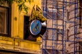 Dragon Clock on facade of building.