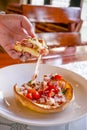 Hungarian pancakes langos with ham and cheese close-up on the table Royalty Free Stock Photo