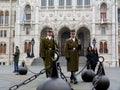 The Hungarian Parliament in Budapest with soldiers on guard duty