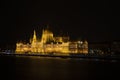 Hungarian Parliament Building by the Danube river captured at night Royalty Free Stock Photo