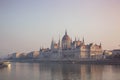 Hungarian parliament building in fog at sunrise in Budapest Royalty Free Stock Photo