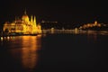 Hungarian Parliament Building located at the bank of Dunabe river with famous Chain Bridge connecting Buda and Pest in Budapest,