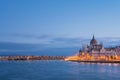 The Hungarian Parliament building at sunrise on the Danube river bank, Budapest, Hungary Royalty Free Stock Photo