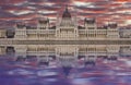 Hungarian Parliament building at sunset with reflection in Danube river, Budapest, Hungary Royalty Free Stock Photo