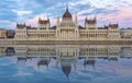 Hungarian Parliament building at sunset with reflection in Danube river, Budapest, Hungary Royalty Free Stock Photo