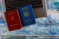 The Hungarian passports and Ukrainian passport with computer keyboard application form or registering citizenship