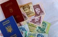 The Hungarian passports and Ukrainian passport with money banknotes forints