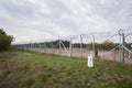 Hungarian soldier watching the Serbian Hungarian border fence.