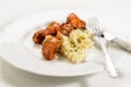 Hungarian style chicken goulash with dumplings on a plate Royalty Free Stock Photo