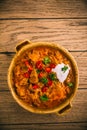 Hungarian Szegedin Goulash with pickled white cabbage sauerkraut and bread dumplings Royalty Free Stock Photo