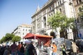 Hungarians and foreign travelers watching and listening music concert show in street fair carnival at Andrassy Avenue road on