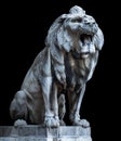 Hungary. Budapest. A large stone lion, growls open its mouth Royalty Free Stock Photo