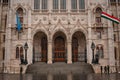 Hungary, Budapest - March 06, 2018: architecture and part of the Budapest hungarian parliament building with hungarian flag Royalty Free Stock Photo