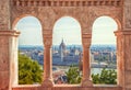 Hungary. Budapest. Parliament view through Fishermans Bastion. Royalty Free Stock Photo