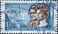 Hungary circa 1965: A post stamp printed in Hungary showing the portrait of Cosmonauts Tereshkova and Nikolaev during their visit