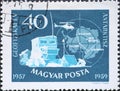 Hungary circa 1959: A post stamp printed in Hungary showing a Soviet Antarctic camp and map of Pole during the International Geoph