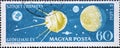Hungary circa 1959: A post stamp printed in Hungary showing a Space probe approaching moon during the International Geophysical Ye