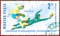Postage stamp printed in Hungary with a picture of a footballs players, with the inscription `World Football Cup Sweden 1958.